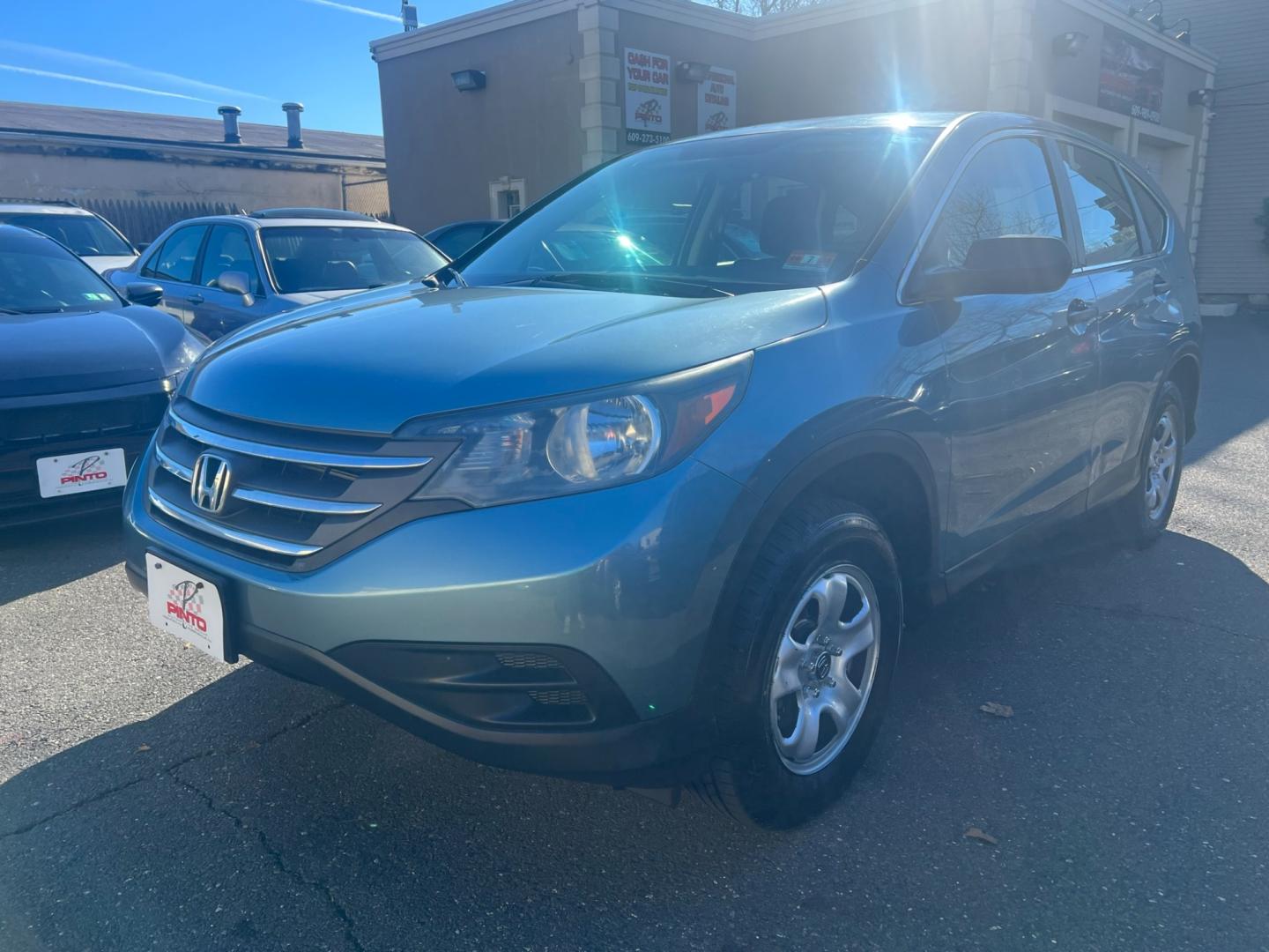 2013 Teal /Gray Honda CR-V LX 4WD 5 Speed AT (5J6RM4H33DL) with an 2.4L L4 DOHC 16V engine, 5 Speed Automatic transmission, located at 1018 Brunswick Ave, Trenton, NJ, 08638, (609) 989-0900, 40.240086, -74.748085 - Photo#4